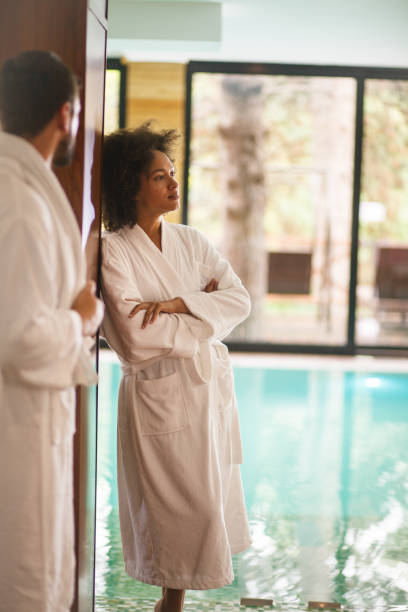 istock Young couple at the swimming pool 1171217648