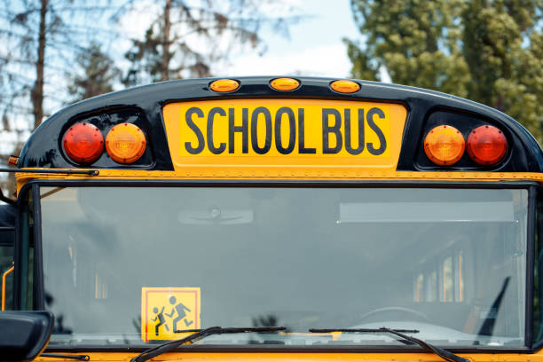 istock School bus sign above front window close-up 1171218022