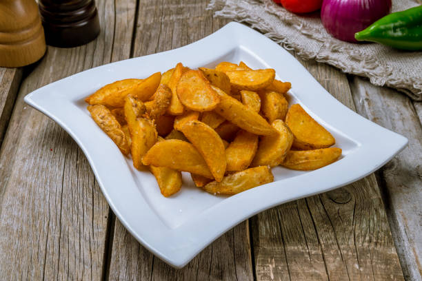 istock The potatoes wedges on the Board 1171220401