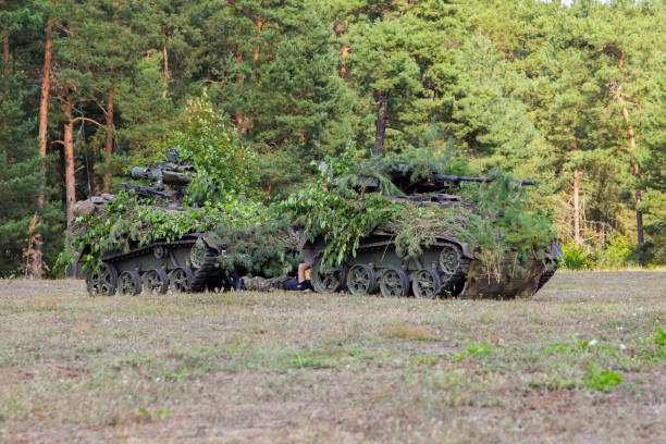 istock Armoured weapons carrier from german army stands at military training area 1171223263
