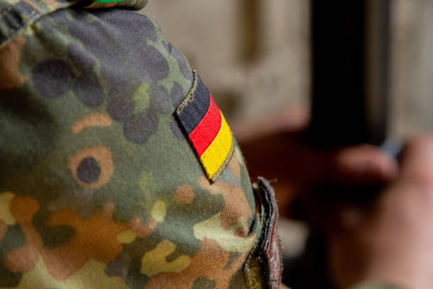 istock German soldier with a gun at military training area 1171223286