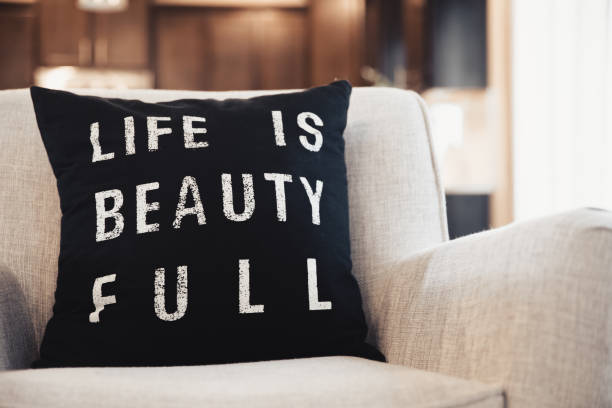Trendy modern throw pillow on a modern chair