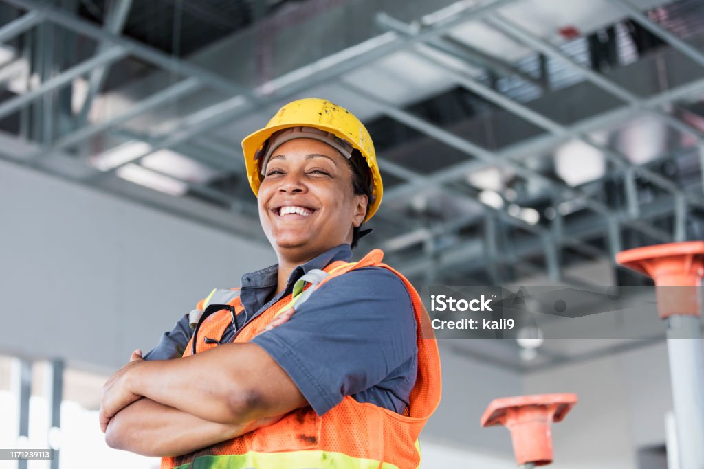 Afroamerikanische Bauarbeiterin - Lizenzfrei Baugewerbe Stock-Foto