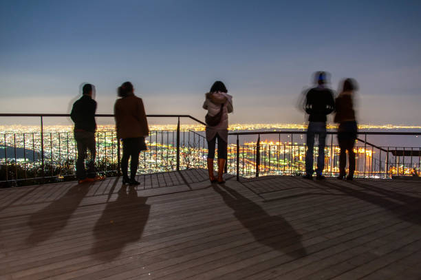 gente a la sombra de la luz de la luna - shadowed fotografías e imágenes de stock