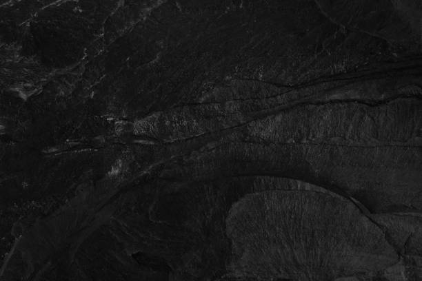 istock Dark grey black slate background or natural stone texture. 1171242510