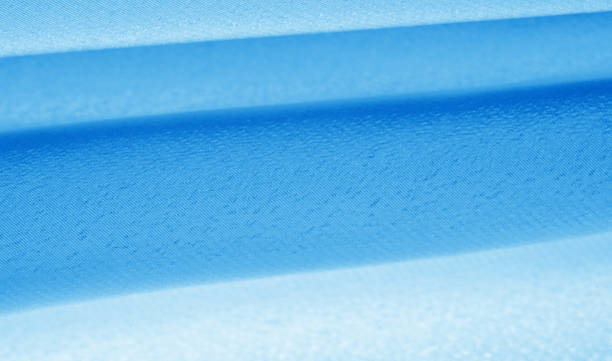 istock Picture. Texture, background. Blue sapphire silk fabric. This luxurious soft fabric has an ultra-soft and creamy surface with a diverse 10 mm pile of shades of gray. 1171244949