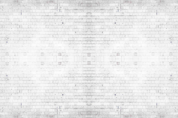 istock Abstract weathered texture stained old stucco light gray. White brick wall background in rural room. Texture horizontal wallpaper. 1171246106