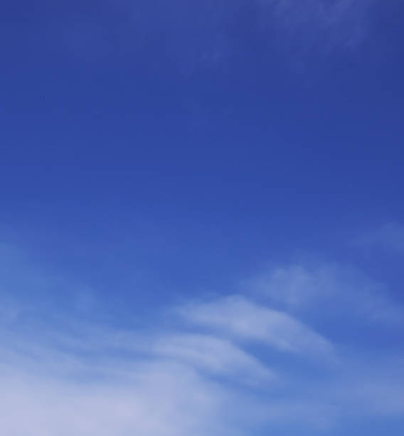 istock White cloud detail in blue sky. Background with copy space. 1171246304