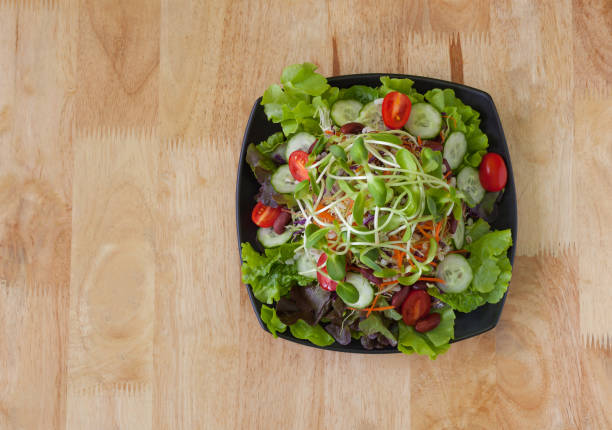 istock vegetarian salad with vegetables organic on dish,top view 1171247014