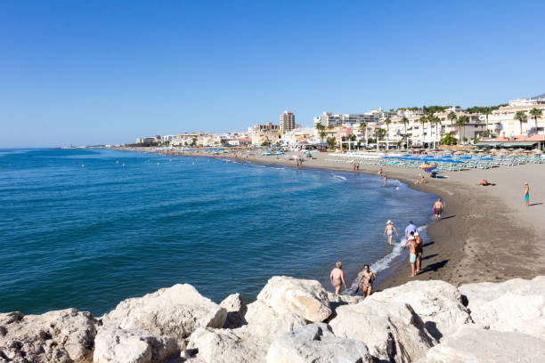 Carihuela Beach Torremolinos, Spain - August 25th 2015: Carihuela Beach, Torremolinos, Spain in a sunny day torremolinos beach stock pictures, royalty-free photos & images
