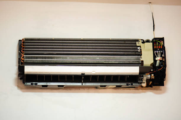 istock Air conditioner with cover removed, visible inside 1171248889