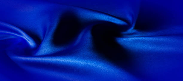 istock Texture, Silk fabric blue, Made just for the mood we will introduce you to the highest quality. This material comes with a trademark. Silk taffeta design and wallpaper of your creativity are waiting! 1171249785