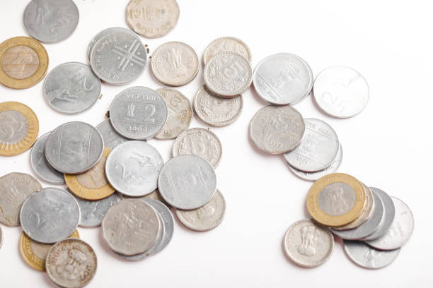 small tree and  Indian coin on white background