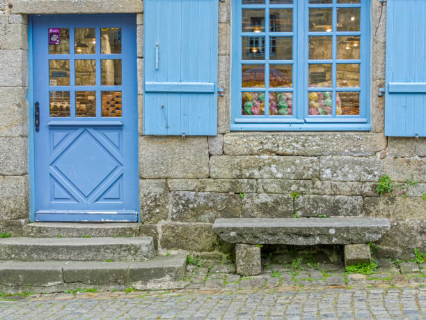 Brittany area of France Rustic window and door in the town of Locronan located in the Brittany area of France old candy store stock pictures, royalty-free photos & images
