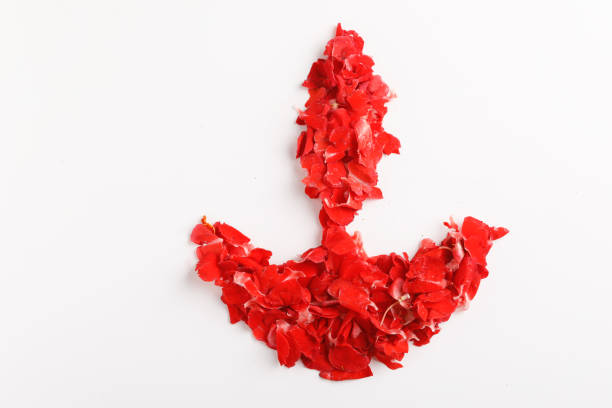 istock Red leaf in Diwali lamp shape on white background 1171252916