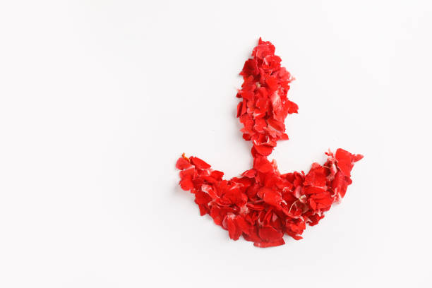 istock Red leaf in Diwali lamp shape on white background 1171253250