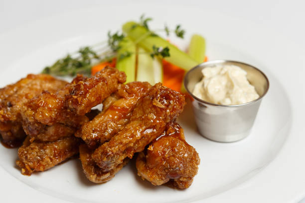istock grilled chicken wings with herbs and a asparagus 1171255535