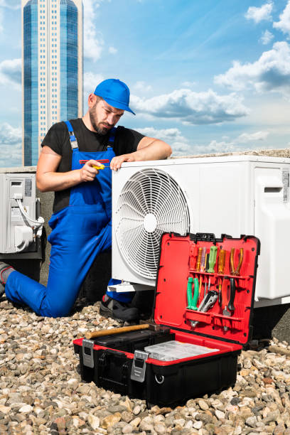 istock Air Conditioner Equipment Installing - Air Conditioner Compressor Installing 1171256694