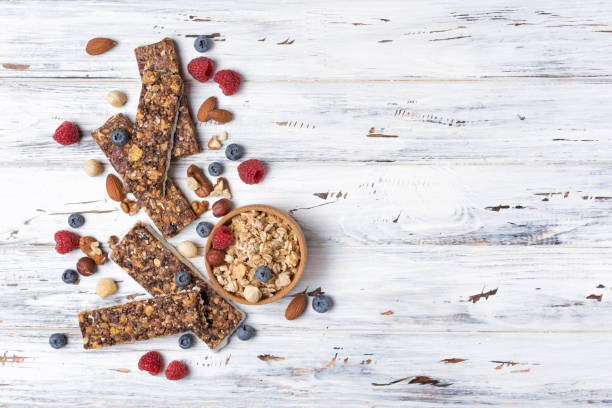 istock Granola energy bar with fresh raspberry, blueberry and mix of nuts 1171256702