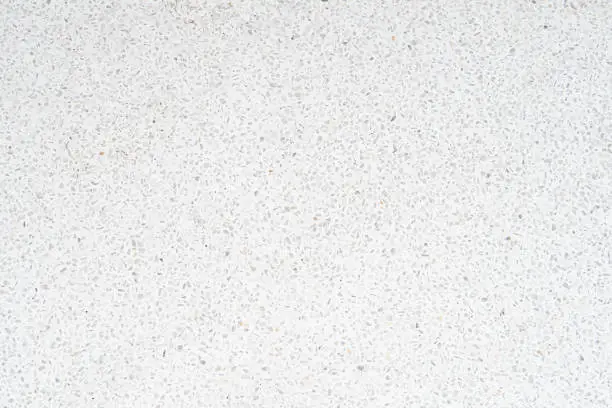 Photo of white and clean terrazzo floor and wall texture.