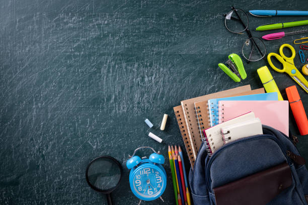 istock School backpack and school supplies with chalkboard background. Education or back to school concept. 1171259877