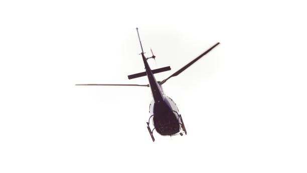 istock helicopter flying isolated on white background 1171261052