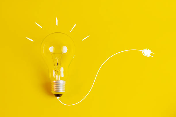 istock Light bulb with concept drawing New ideas, soft focus 1171261890