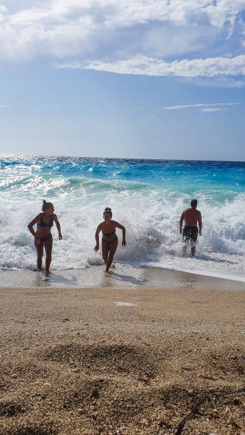 istock People having fun with the waves 1171263163