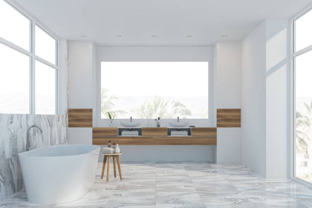 istock White marble bathroom interior, tub and sink 1171264017