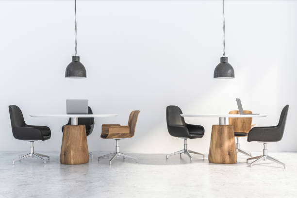 istock Coworking area in modern white office 1171264835