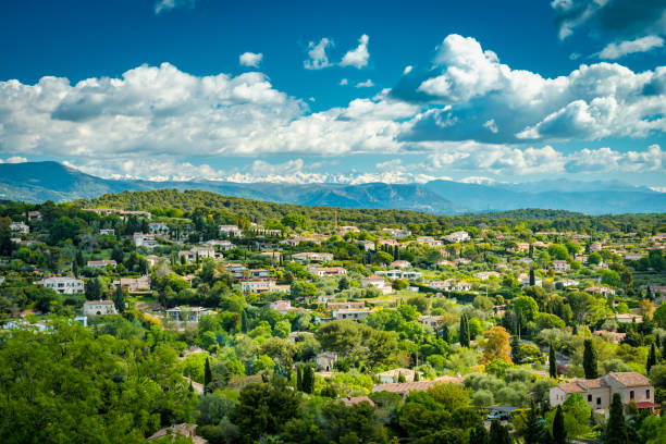 Country mansions of Mougins in the region Alpes-Maritimes Country mansions of Mougins in the region Alpes-Maritimes in France with the Alps in background provence alpes cote dazur stock pictures, royalty-free photos & images