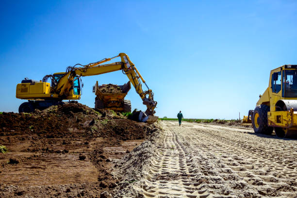 istock Trace of huge road roller with spikes to compact soil at construction 1171265363