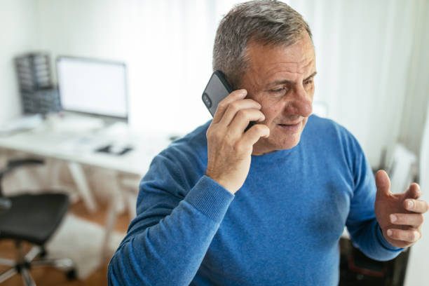 istock Businessman uses mobile phone 1171266291