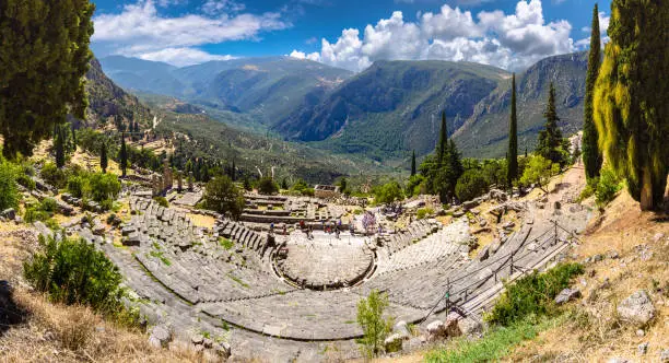 Ancient city of Delphi with ruins of the temple of Apollo, the omfalos (center) of the earth, theater, arena and other buildings, Greece