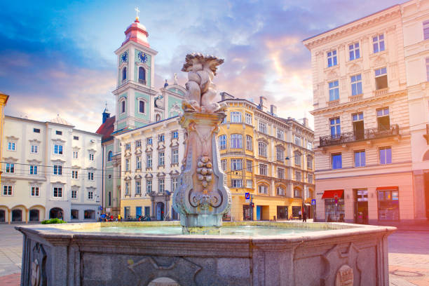 istock Fountain and Old Cathedral on the main square in Linz 1171277035