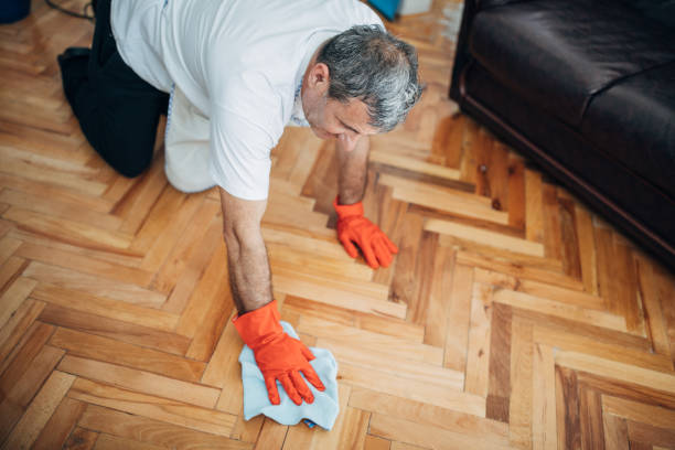istock An older man is cleaning the house 1171277165