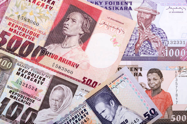 istock Old money from Madagascar a background 1171277330