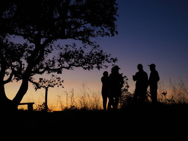 istock People discussion among sunset twilight sky 1171277960