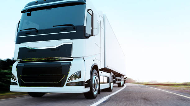 istock semi-truck with trailer driving on road 1171278196