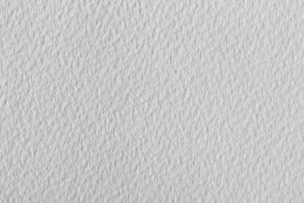 istock Closeup of textured white paper. Can be used as texture in art projects. 1171279311