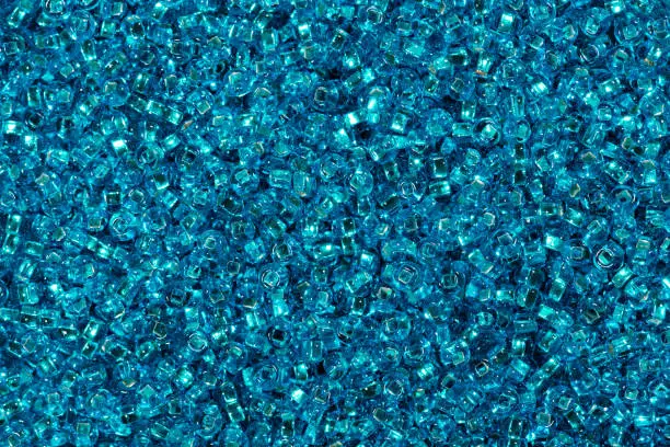 Background of blue glass beads. High resolution photo.