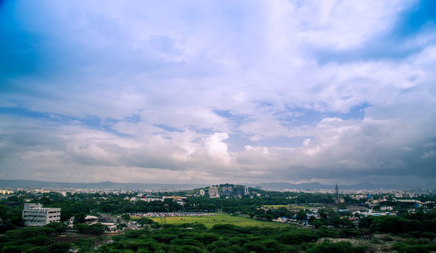 istock Aerial view of Pune city, Maharashtra, India with sky text space 1171280098