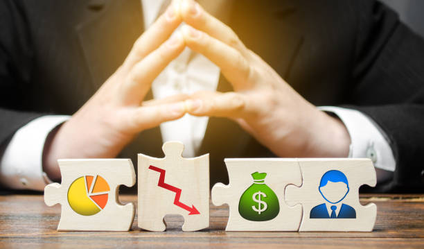 istock Businessman sitting in thought over puzzle wrong business model, unprofitability and inefficiency. Failed project. Unprofitable, high costs. Testing, finding a solution. Risk management 1171283573