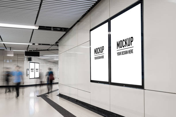 istock Blank billboard located in underground hall or subway for advertising, mockup concept, Low light speed shutter 1171284486