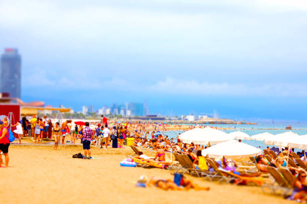 Barceloneta Beach (Barcelona,​​Spain) Barceloneta Beach (Barcelona,​​Spain). Shooting Location: Barcelona 日傘 stock pictures, royalty-free photos & images