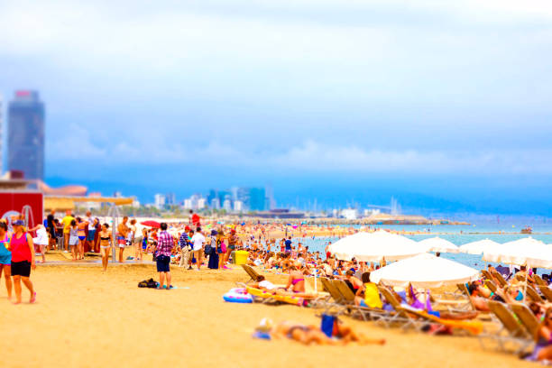 Barceloneta Beach (Barcelona,​​Spain) Barceloneta Beach (Barcelona,​​Spain). Shooting Location: Barcelona 日傘 stock pictures, royalty-free photos & images