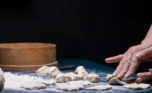 istock pieces of dough on the table. 1171286876