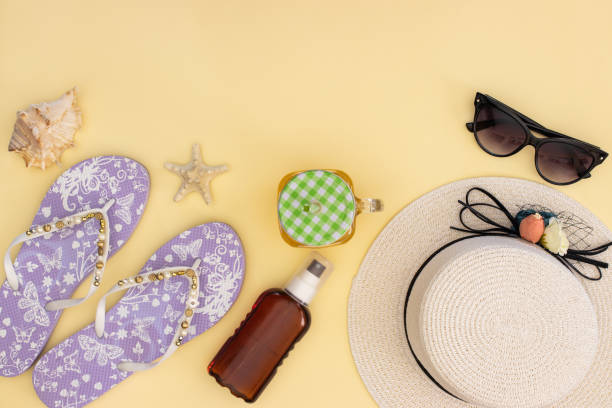 istock Summer and beach accessories on yellow background 1171287403