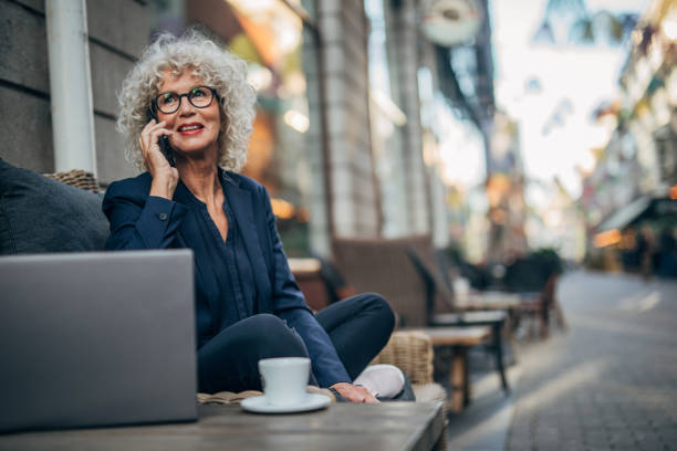 istock Beautiful senior woman in cafe 1171287432