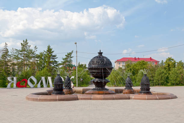 Omsk, Russia - July 19 2018: The Abundance Fountain (Russian: Фонтан Изобилие) in the middle of the \